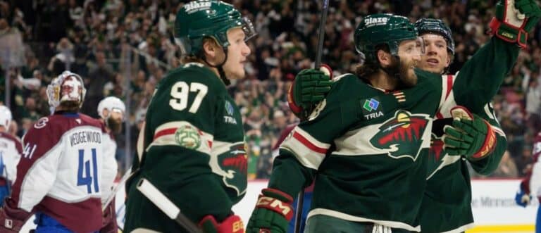 Minnesota Wild right wing Ryan Hartman (38) is congratulated by teammates after scoring on the Colorado Avalanche in the second period of game three of the second round of the 2026 Stanley Cup Playoffs at Grand Casino Arena.