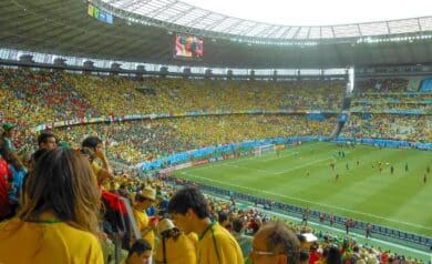 Soccer fans watching a World Cup match between Brazil and Mexico inside a stadium in Fortaleza, Brazil