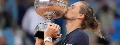 Alexander Zverev of Germany kisses the trophy after winning the mens singles final against Flavio Cobolli of Italy on day 15 at Stade Roland Garros. Jun 7, 2026; Paris, France.