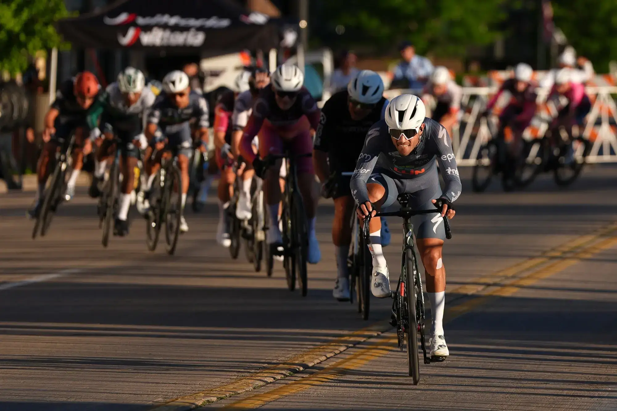 Cyclists compete in a race during Tour De Pere, part of the Tour of America’s Dairyland road cycling series, on June 22, 2026, in De Pere, Wis.