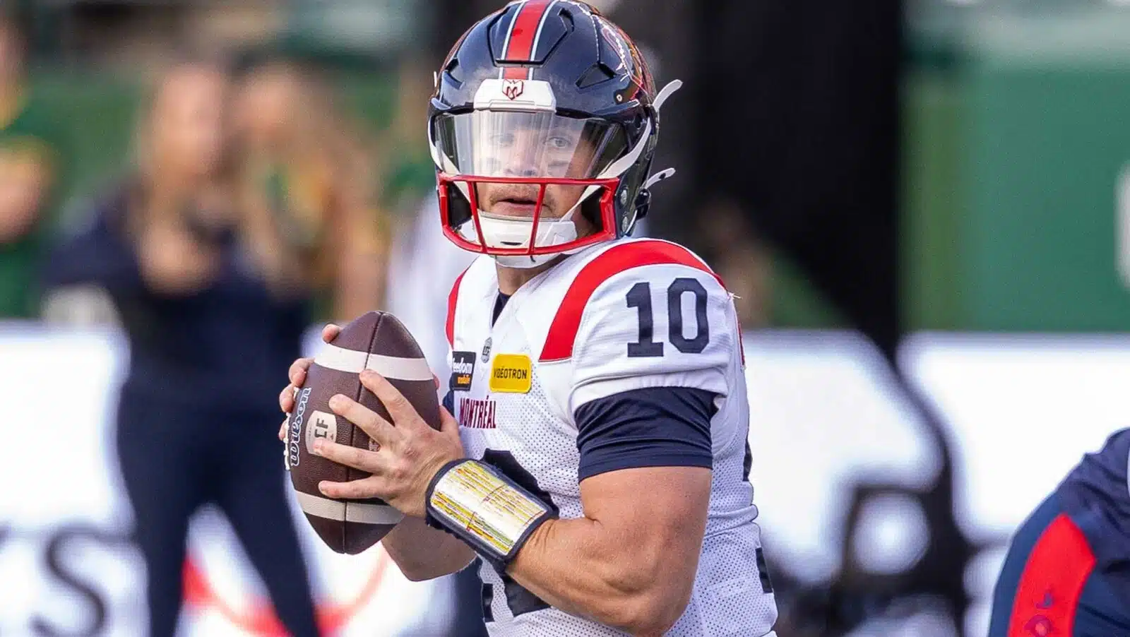 David Alexander, quarterback for the Montreal Alouettes of the CFL, looks to make a pass in a CFL game