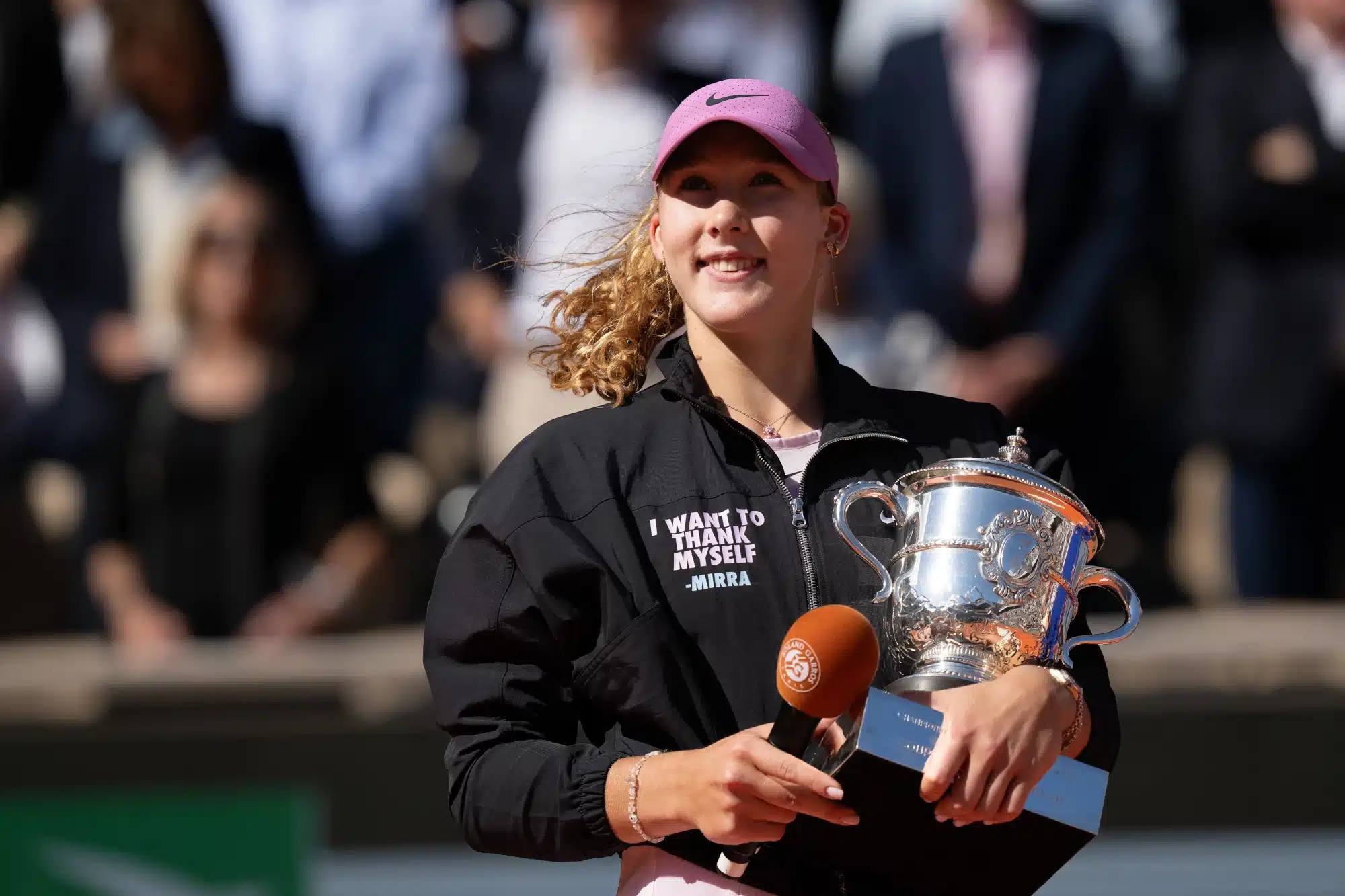 Mirra Andreeva poses with the trophy after winning the women’s singles final against Maja Chwalinska of Poland at Stade Roland Garros. Jun 6, 2026; Paris, France.