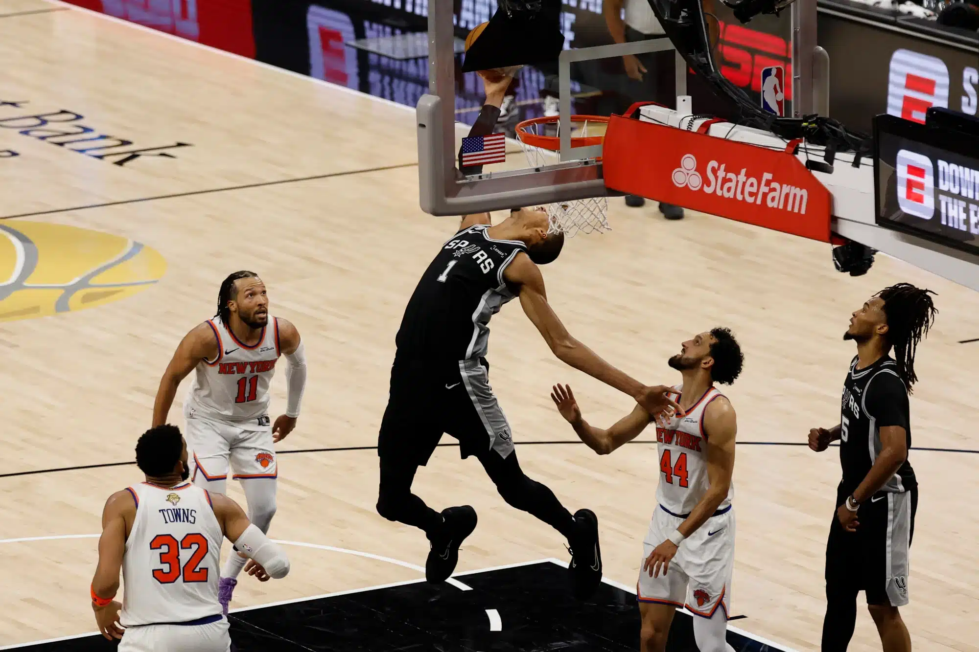 Jun 3, 2026; San Antonio, Texas, USA; San Antonio Spurs forward Victor Wembanyama (1) shoots the ball against New York Knicks guard Landry Shamet (44) in the second half during game one of the 2026 NBA Finals at Frost Bank Center.