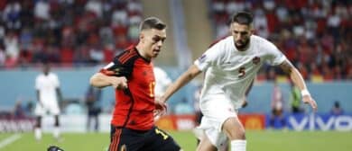 Belgium midfielder Leandro Trossard (17) dribbles in front of Canada defender Steven Vit ria (5) during the second half of a group stage match during the 2022 FIFA World Cup at Ahmad Bin Ali Stadium