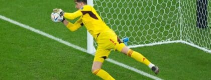 Belgium goalkeeper Thibaut Courtois (1) makes a save during the second half of a group stage match against Canada during the 2022 FIFA World Cup at Ahmad Bin Ali Stadium