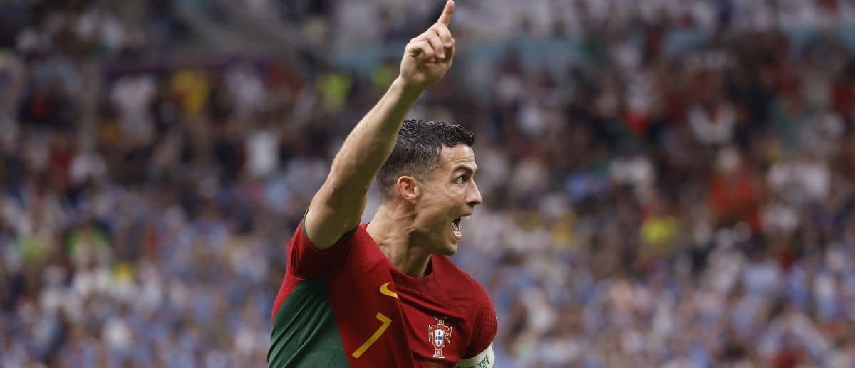 Portugal forward Cristiano Ronaldo (7) celebrates his goal scored against Uruguay during the second half of the group stage match in the 2022 World Cup at Lusail Stadium. The goal would instead be credited to midfielder Bruno Fernandes (8).