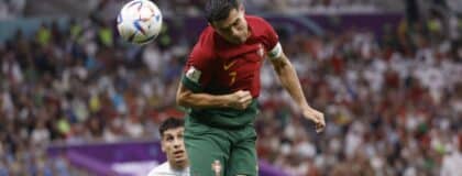 Portugal forward Cristiano Ronaldo (7) scores a goal against Uruguay during the second half of the group stage match in the 2022 World Cup at Lusail Stadium. The goal would instead be credited to midfielder Bruno Fernandes (8)