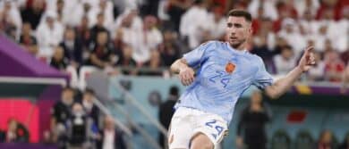 Spain defender Aymeric Laporte (24) controls the ball against Morocco during the first half in the round of sixteen match of the 2022 FIFA World Cup at Education City Stadium.