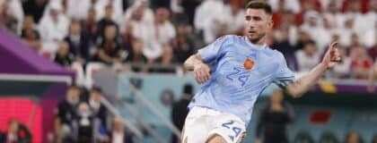 Spain defender Aymeric Laporte (24) controls the ball against Morocco during the first half in the round of sixteen match of the 2022 FIFA World Cup at Education City Stadium.