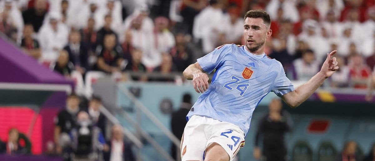 Spain defender Aymeric Laporte (24) controls the ball against Morocco during the first half in the round of sixteen match of the 2022 FIFA World Cup at Education City Stadium.