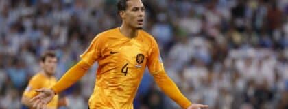 Netherlands defender Virgil van Dijk (4) reacts against Argentina in the quarterfinals of the 2022 FIFA World Cup at Lusail Stadium