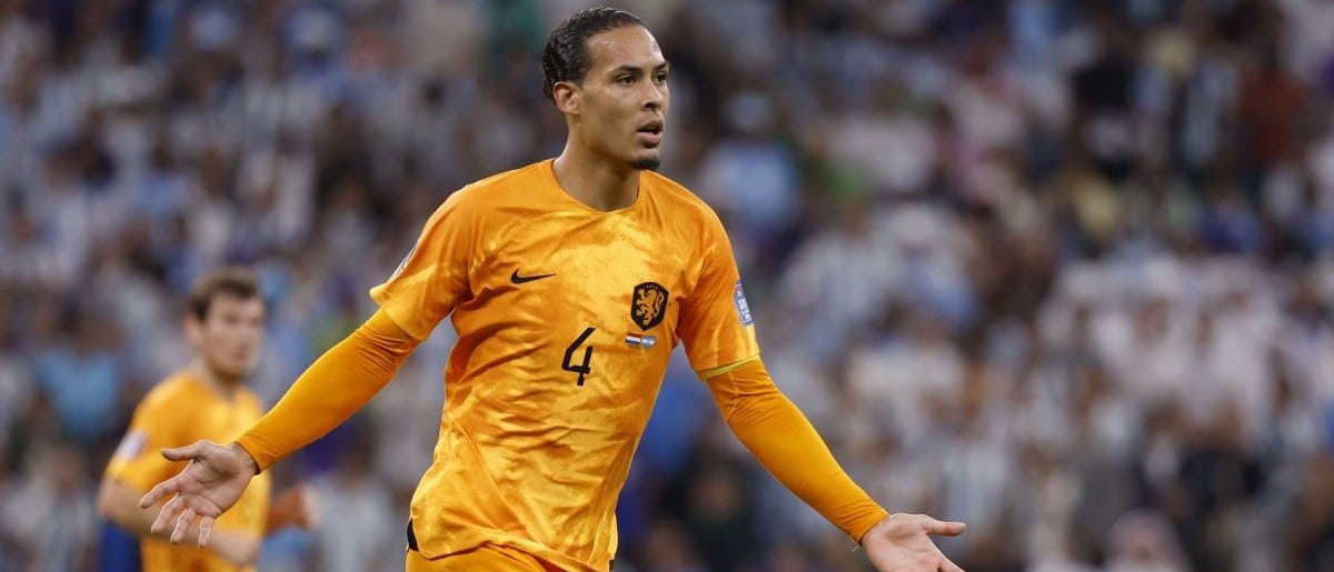 Netherlands defender Virgil van Dijk (4) reacts against Argentina in the quarterfinals of the 2022 FIFA World Cup at Lusail Stadium