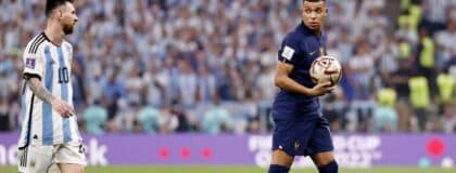 France forward Kylian Mbappe (10) and Argentina forward Lionel Messi (10) look at each other during the second half of the 2022 World Cup final at Lusail Stadium
