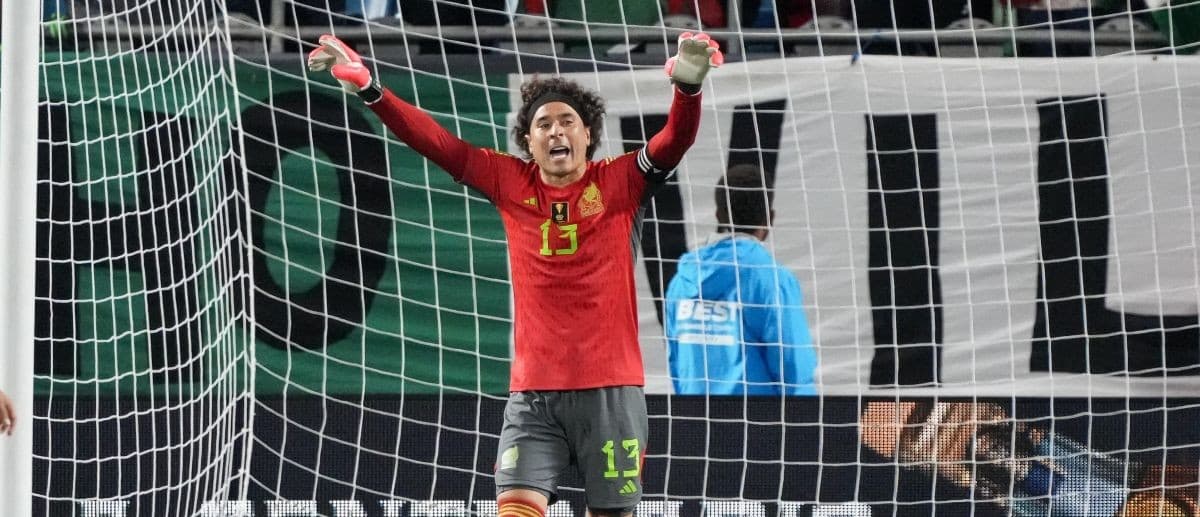 Mexico goalkeeper Guillermo Ochoa (13) yells instructions to his teammates during the second half against Ghana at Bank of America Stadium.