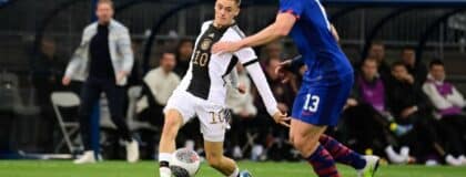 Germany midfielder Florian Wirtz (10) against United States defender Tim Ream (13) during the first half at Pratt & Whitney Stadium
