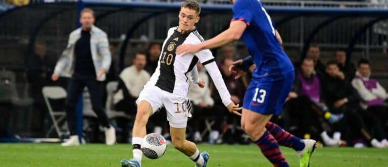 Germany midfielder Florian Wirtz (10) against United States defender Tim Ream (13) during the first half at Pratt & Whitney Stadium