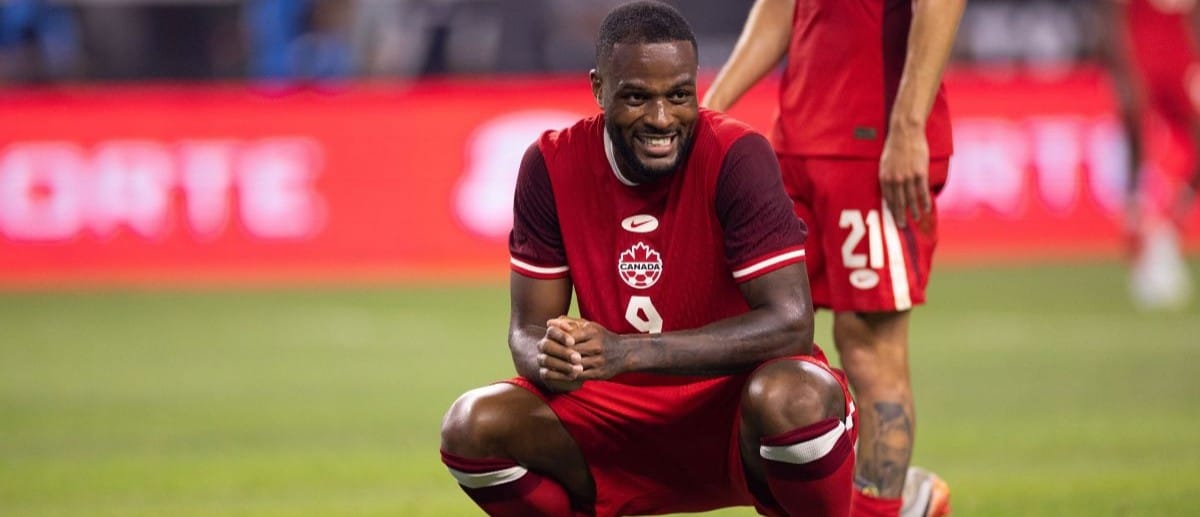 Canada forward Cyle Larin (9) reacts after missing a goal against Mexico in the first half at AT&T Stadium