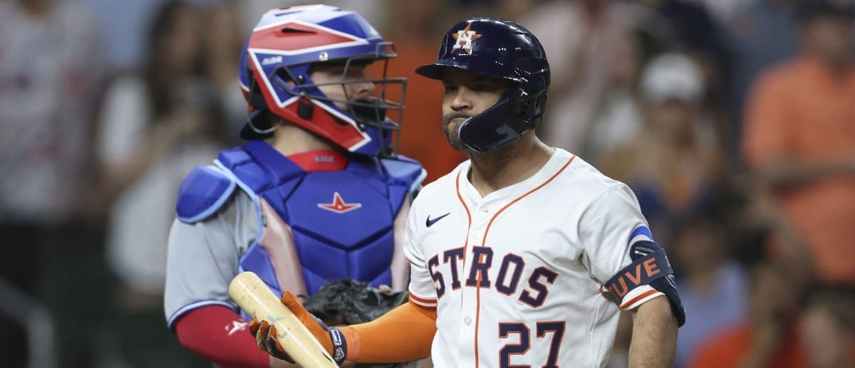 Houston Astros left fielder Jose Altuve (27) reacts after striking out during the sixth inning against the Toronto Blue Jays at Daikin Park.