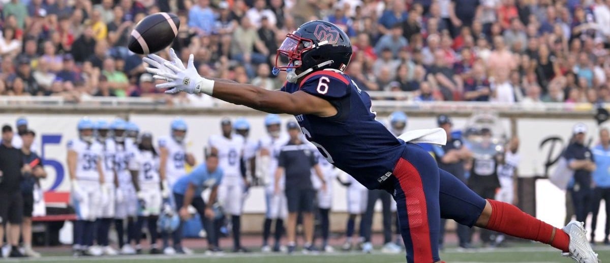 Montreal Alouettes wide receiver Tyson Philpot (6) reaches for the ball in the end zone during the first half against the Toronto Argonauts at Percival-Molson stadium.