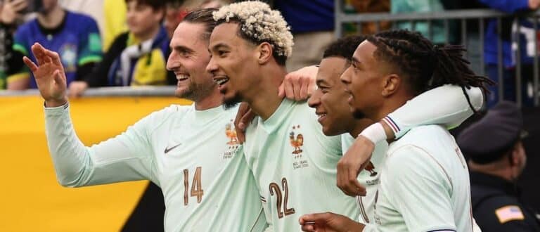 France forward Hugo Ekitike (22) celebrates his goal against Brazil with midfielder Adrien Rabiot (14), forward Kylian Mbappe (10) and forward Michael Olise (11) (right) during the second half at Gillette Stadium