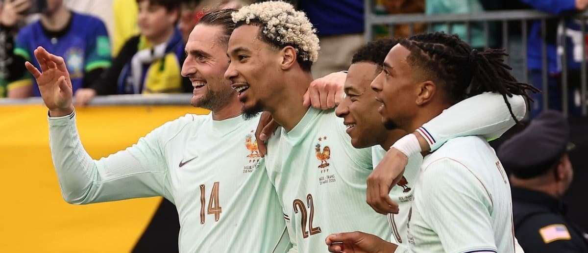 France forward Hugo Ekitike (22) celebrates his goal against Brazil with midfielder Adrien Rabiot (14), forward Kylian Mbappe (10) and forward Michael Olise (11) (right) during the second half at Gillette Stadium