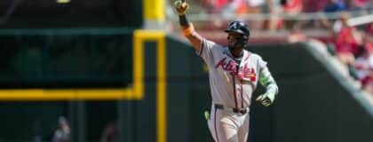 Atlanta Braves outfielder Ronald Acuna Jr. (13) gestures after hitting an RBI single against the Cincinnati Reds in the ninth inning at Great American Ball Park