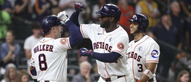 Houston Astros designated hitter Yordan Alvarez (44) celebrates with first baseman Christian Walker (8) after hitting a home run during the first inning against the Pittsburgh Pirates at Daikin Park