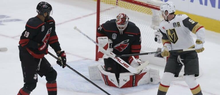 Carolina Hurricanes goaltender Frederik Andersen (31) and defenseman K'andre Miller (19) defend against Vegas Golden Knights center Jack Eichel (9) during the second period in game one of the 2026 Stanley Cup Final at Lenovo Center.