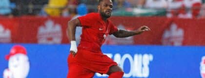 Team Canada forward Cyle Larin (9) follows the play in a game against Uzbekistan at Commonwealth Stadium