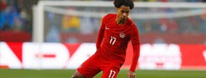 Team Canada midfielder Tajon Buchanan (17) carries the ball in a game against Uzbekistan at Commonwealth Stadium