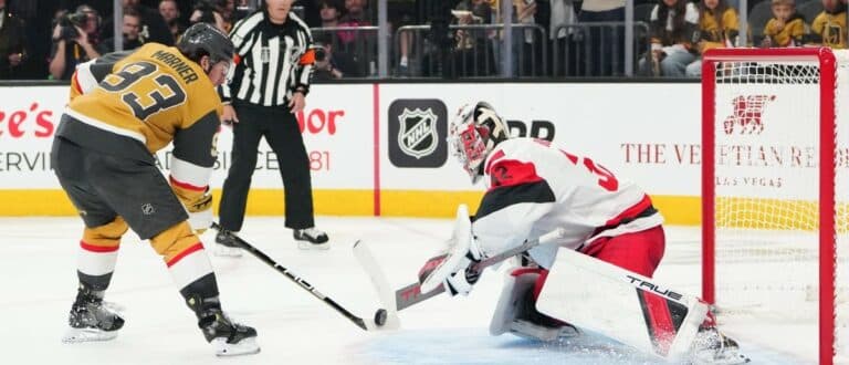 Carolina Hurricanes goaltender Brandon Bussi (32) makes a save against a penalty shot by Vegas Golden Knights right wing Mitch Marner (93) during the third period in game three of the 2026 Stanley Cup Final at T-Mobile Arena