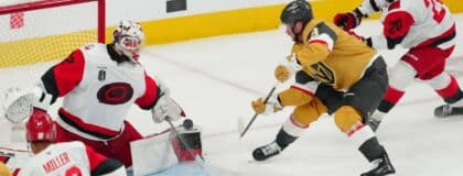 Carolina Hurricanes goaltender Brandon Bussi (32) stops a shot by Vegas Golden Knights center Jack Eichel (9) during the 3rd period in game four of the 2026 Stanley Cup Final at T-Mobile Arena