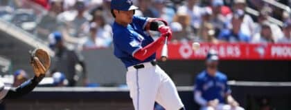 Toronto Blue Jays third baseman Kazuma Okamoto (7) hits a home run against the New York Yankees during the third inning at Rogers Centre