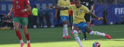 Brazil forward Raphinha (11) kicks the ball during a Group C match of the 2026 FIFA World Cup against Morocco at New York New Jersey Stadium