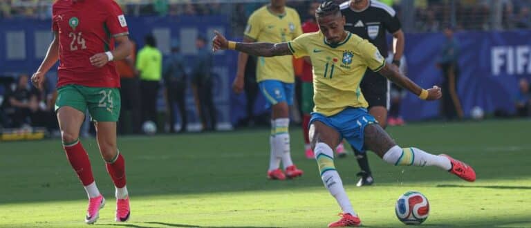 Brazil forward Raphinha (11) kicks the ball during a Group C match of the 2026 FIFA World Cup against Morocco at New York New Jersey Stadium