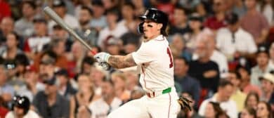 Boston Red Sox left fielder Jarren Duran (16) hits a solo home run against the Toronto Blue Jays during the eighth inning at Fenway Park