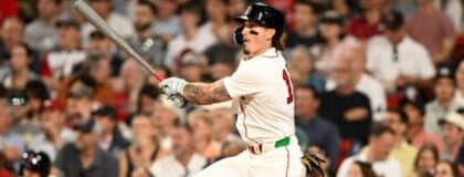 Boston Red Sox left fielder Jarren Duran (16) hits a solo home run against the Toronto Blue Jays during the eighth inning at Fenway Park