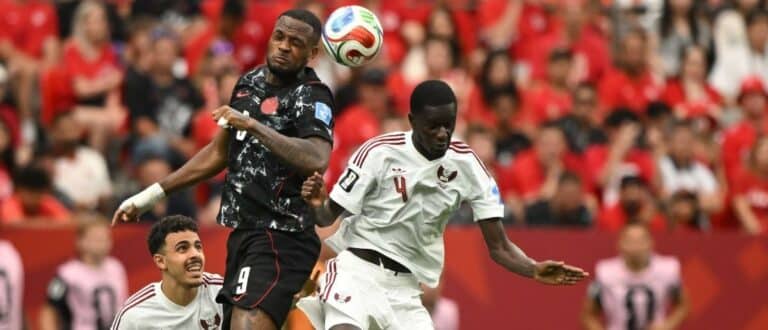 Canada forward Cyle Larin (9) goes up for a header against q4- during the second half during a Group B match in the 2026 FIFA World Cup at BC Place Vancouver.