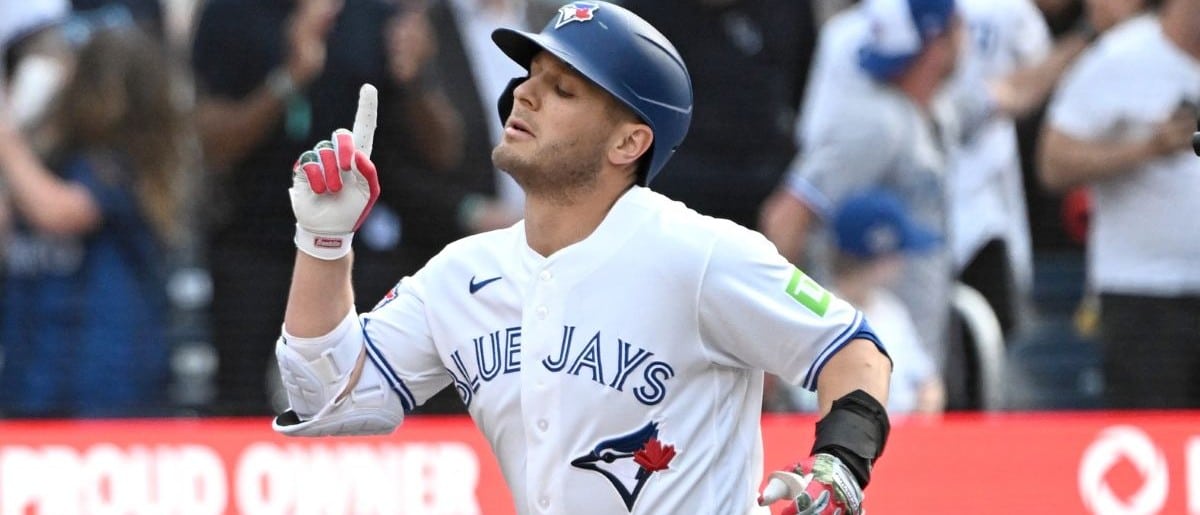 Toronto Blue Jays center fielder Daulton Varsho (5) rounds the bases after hitting a two run home run against the Houston Astros in the seventh inning at Rogers Centre