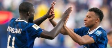 France forward Kylian Mbappé (10) and France defender Dayot Upamecano (4) high-five after drafting Sweden 3-0 during a 2026 FIFA World Cup round of 32 match between France and Sweden at New York New Jersey Stadium on Tuesday, June 30, 2026, in East Rutherford, NJ.