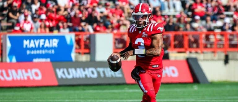 Calgary Stampeders quarterback Vernon Adams Jr (3) runs with the ball against the Hamilton Tiger-Cats during the first half at McMahon Stadium