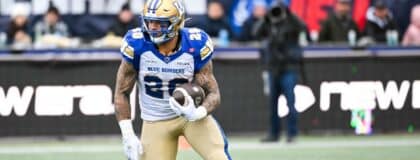 Winnipeg Blue Bombers running back Brady Oliveira (20) runs the ball against the Montreal Alouettes during the first quarter at Percival-Molson stadium.