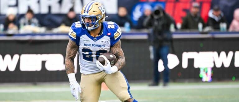 Winnipeg Blue Bombers running back Brady Oliveira (20) runs the ball against the Montreal Alouettes during the first quarter at Percival-Molson stadium.