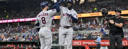 Houston Astros first baseman Christian Walker (8) and designated hitter Yordan Alvarez (44) celebrate after Alvarez hits a home run against the Texas Rangers during the sixth inning at Globe Life Field.