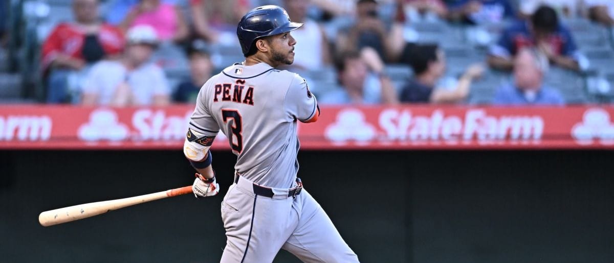 Houston Astros shortstop Jeremy Pena (3) hits a home run during the third inning against the Los Angeles Angels at Angel Stadium.