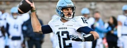 Toronto Argonauts quarterback Chad Kelly (12) passes the ball against the Montreal Alouettes during the first quarter at Percival-Molson Memorial Stadium.