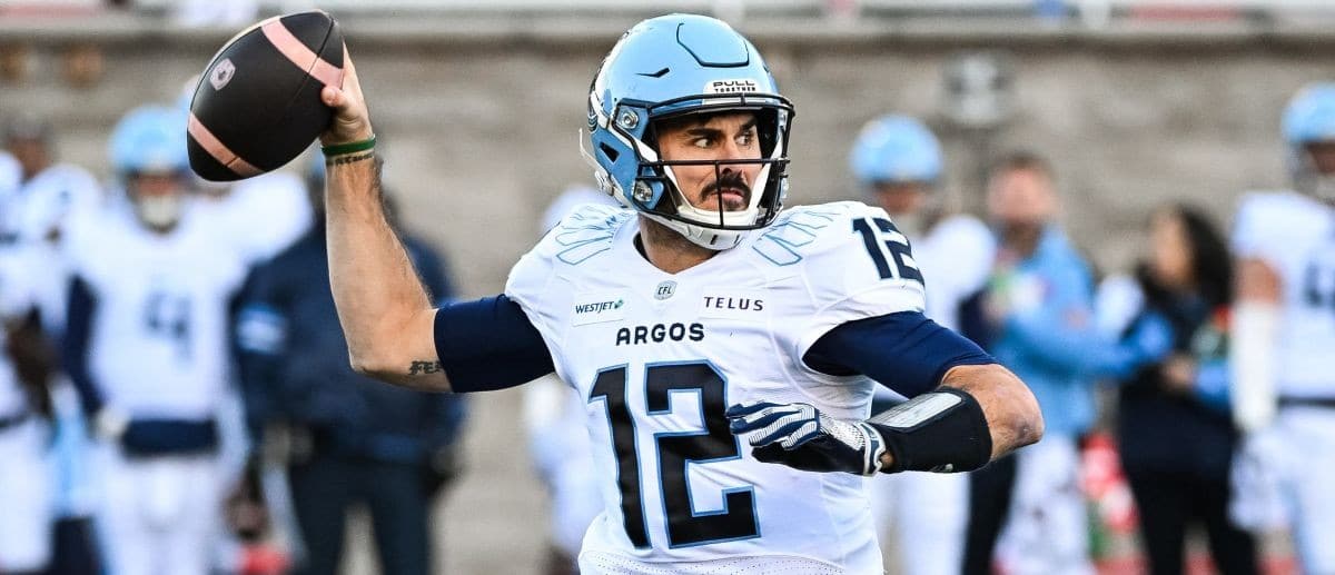 Toronto Argonauts quarterback Chad Kelly (12) passes the ball against the Montreal Alouettes during the first quarter at Percival-Molson Memorial Stadium.