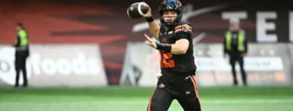 BC Lions quarterback Nathan Rourke (12) looks to pass during the first half against the Edmonton Elks at BC Place Stadium.