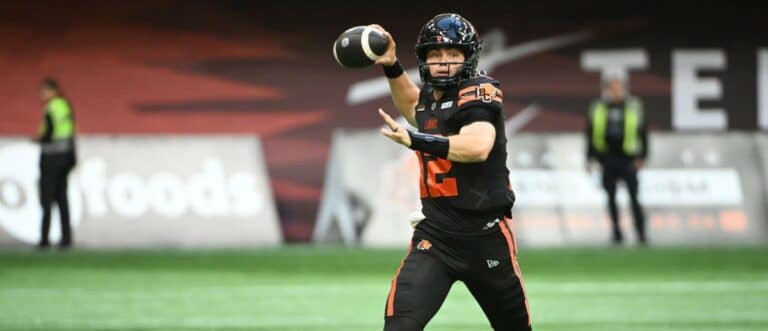 BC Lions quarterback Nathan Rourke (12) looks to pass during the first half against the Edmonton Elks at BC Place Stadium.