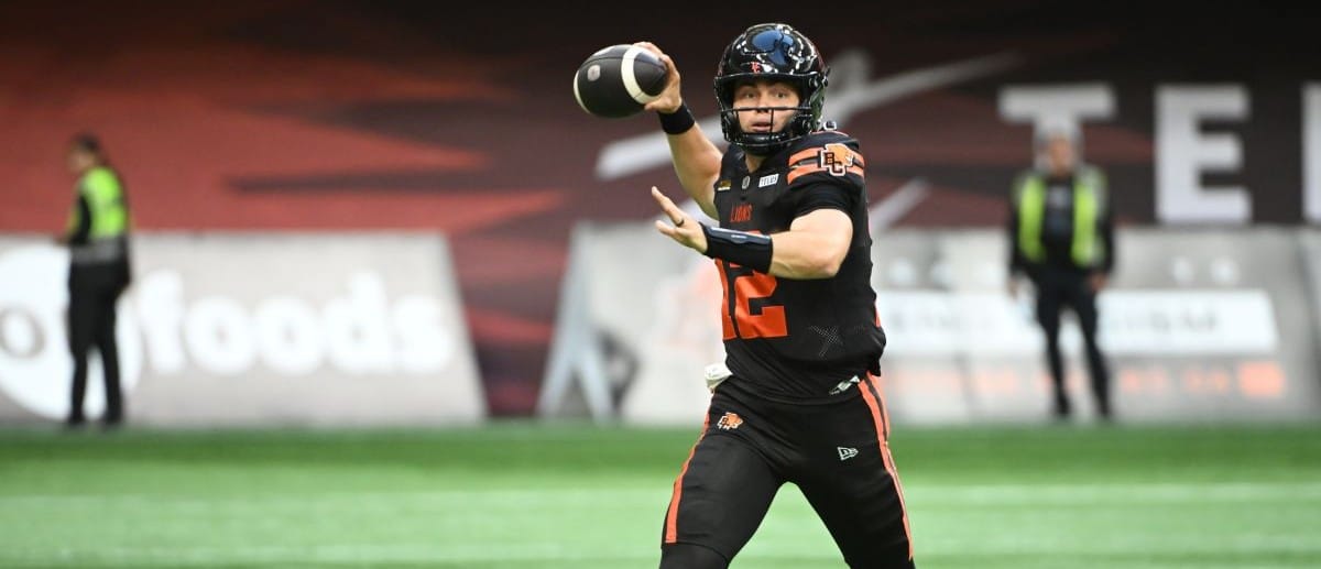 BC Lions quarterback Nathan Rourke (12) looks to pass during the first half against the Edmonton Elks at BC Place Stadium.